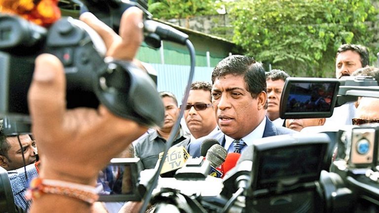 Sri Lanka former FM grilled over a bond scam and conflict of interests